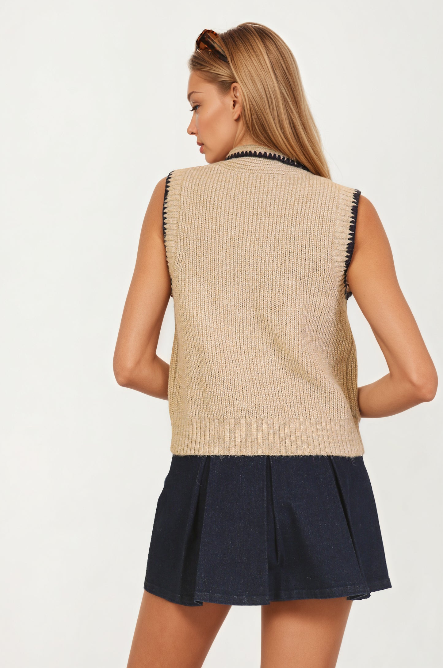 Sleeveless Knit Vest with Contrast Trim and Bow Detail