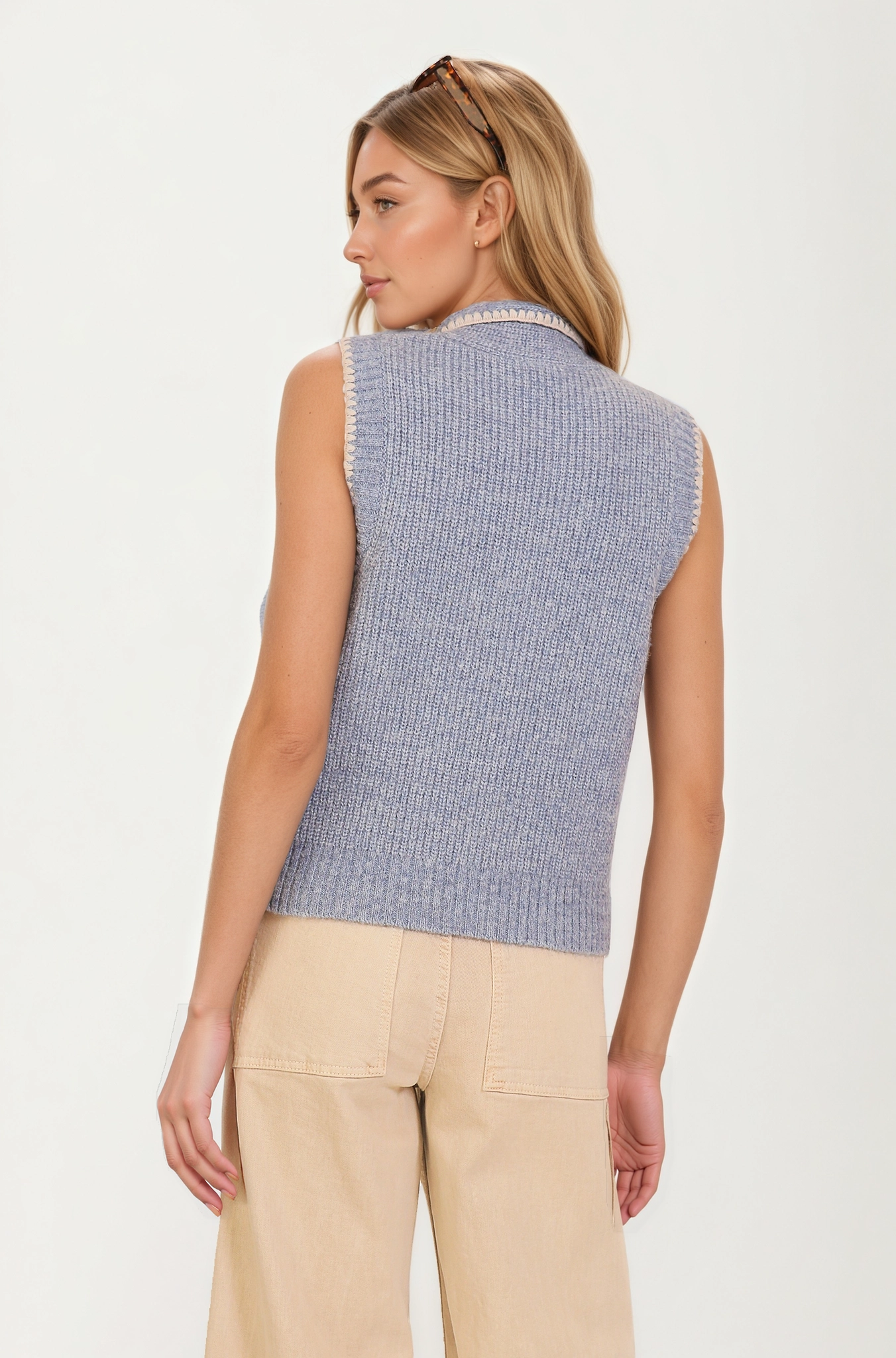 Sleeveless Knit Vest with Contrast Trim and Bow Detail