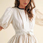 Puff Sleeve Mini Dress with Front Keyhole Drawstring Waist Contrast Trim and Structured Fit