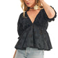 Black Eyelet Peplum Top with Deep V-Neckline