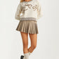 Knit Sweater with Textured Bow Embroidery and Striped Trim
