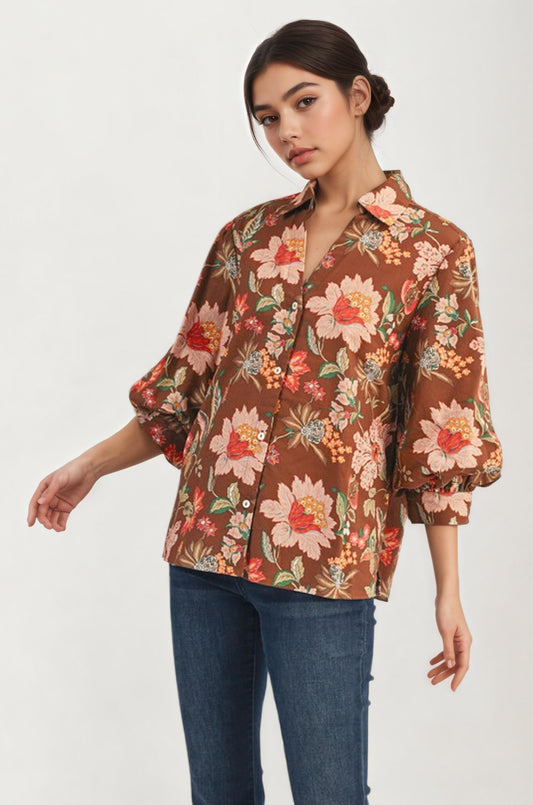 Button-up blouse with voluminous sleeves and floral print