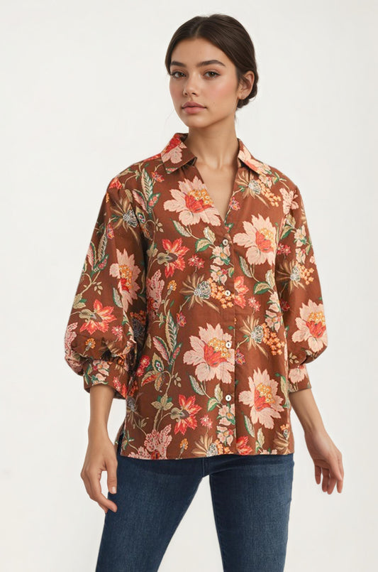 Button-up blouse with voluminous sleeves and floral print