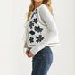 White Quilted Vest with Bold Black Floral Embroidery