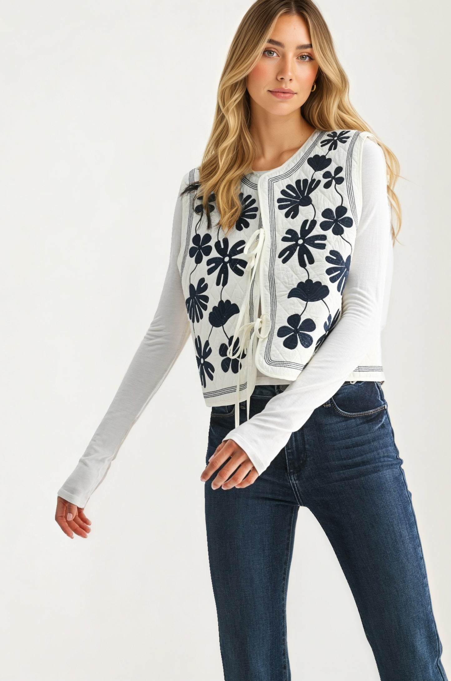 White Quilted Vest with Bold Black Floral Embroidery