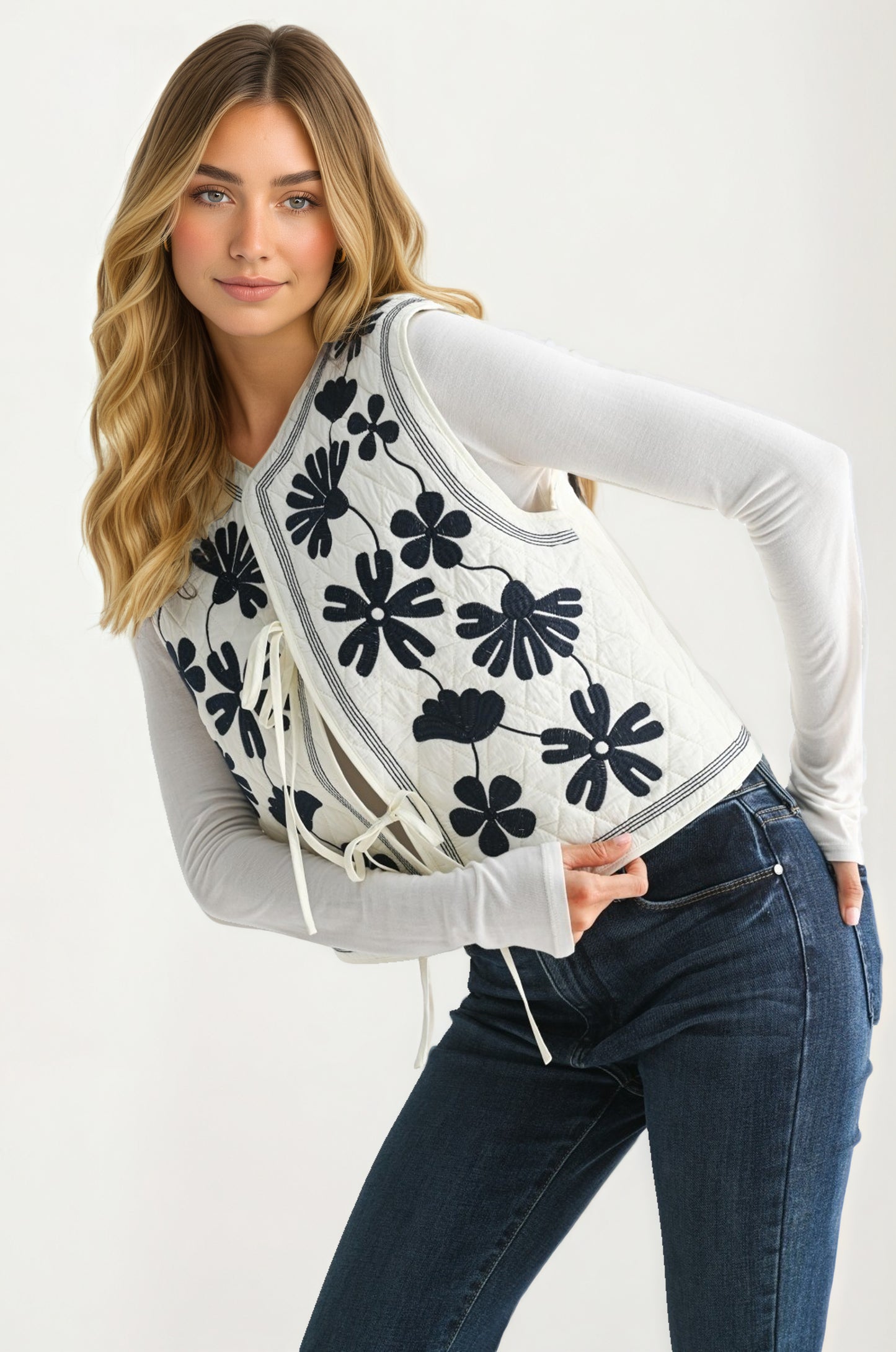 White Quilted Vest with Bold Black Floral Embroidery