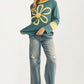 Long Sleeve Top with Bold Floral Applique and Relaxed Fit