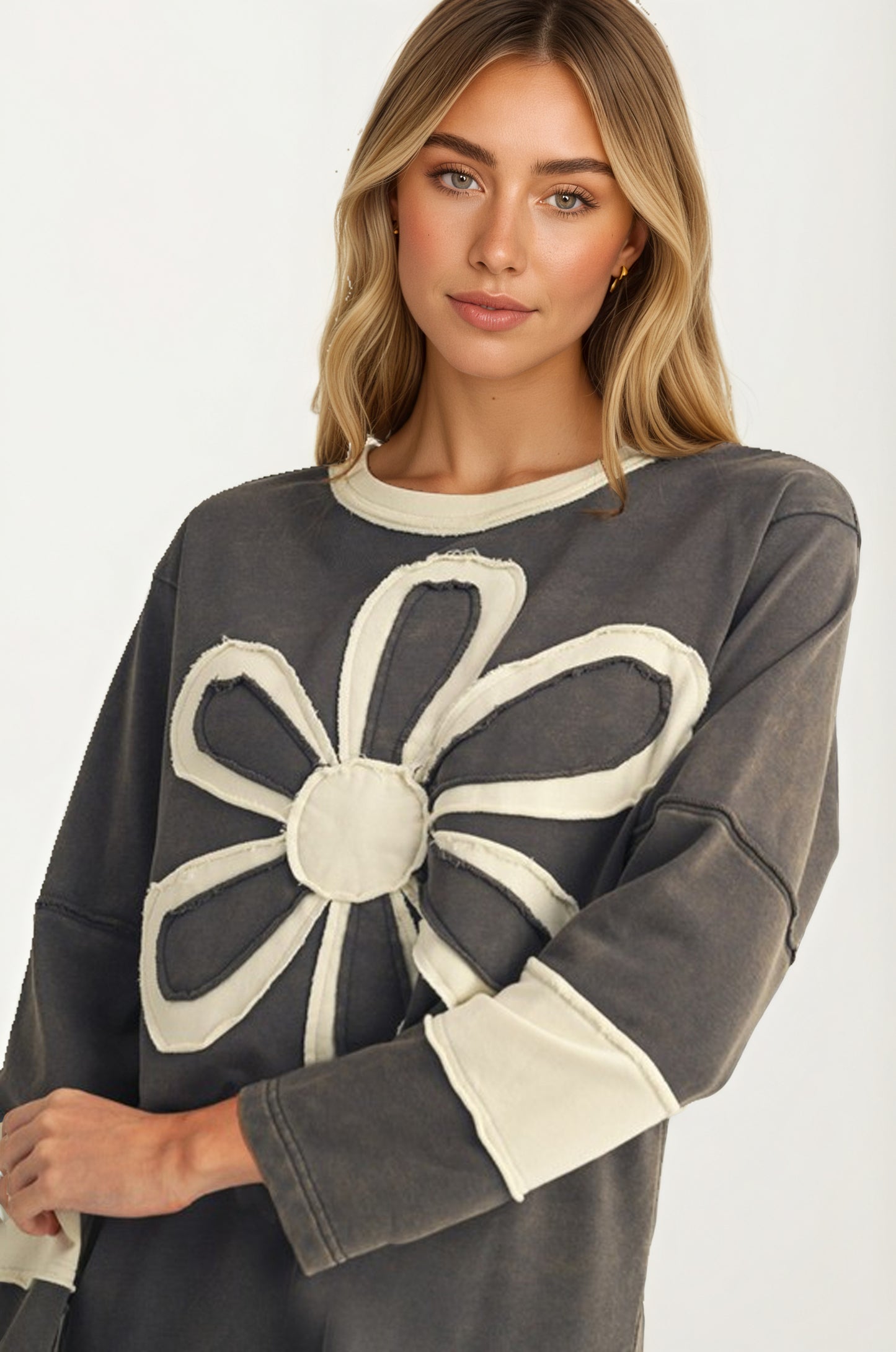 Long Sleeve Top with Bold Floral Applique and Relaxed Fit
