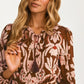 Long Sleeve Midi Dress with Tie Neck and Flowing Silhouette