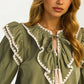 Olive Ruffle Trim Top With Tassel Tie Neckline