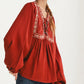 Flowy Long Sleeve Blouse with Embroidered Yoke and Tie Neckline