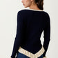 V-Neck Knit Sweater with Ruffle Trim
