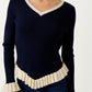 V-Neck Knit Sweater with Ruffle Trim