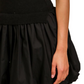 Sleek Black Knit Top and Woven Bubble Hem Mini Dress