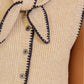 Sleeveless Knit Vest with Contrast Trim and Bow Detail