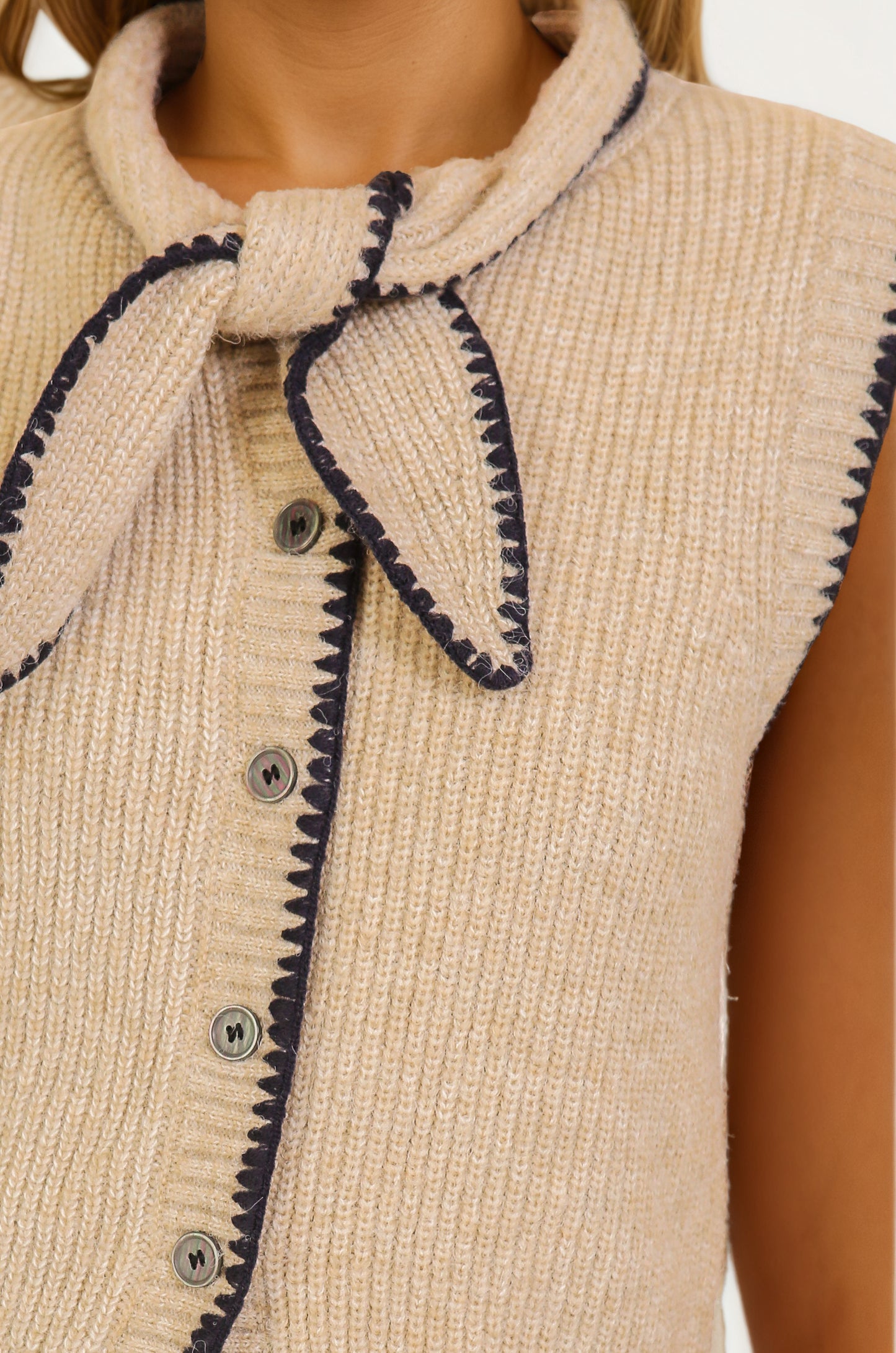 Sleeveless Knit Vest with Contrast Trim and Bow Detail