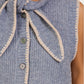 Sleeveless Knit Vest with Contrast Trim and Bow Detail