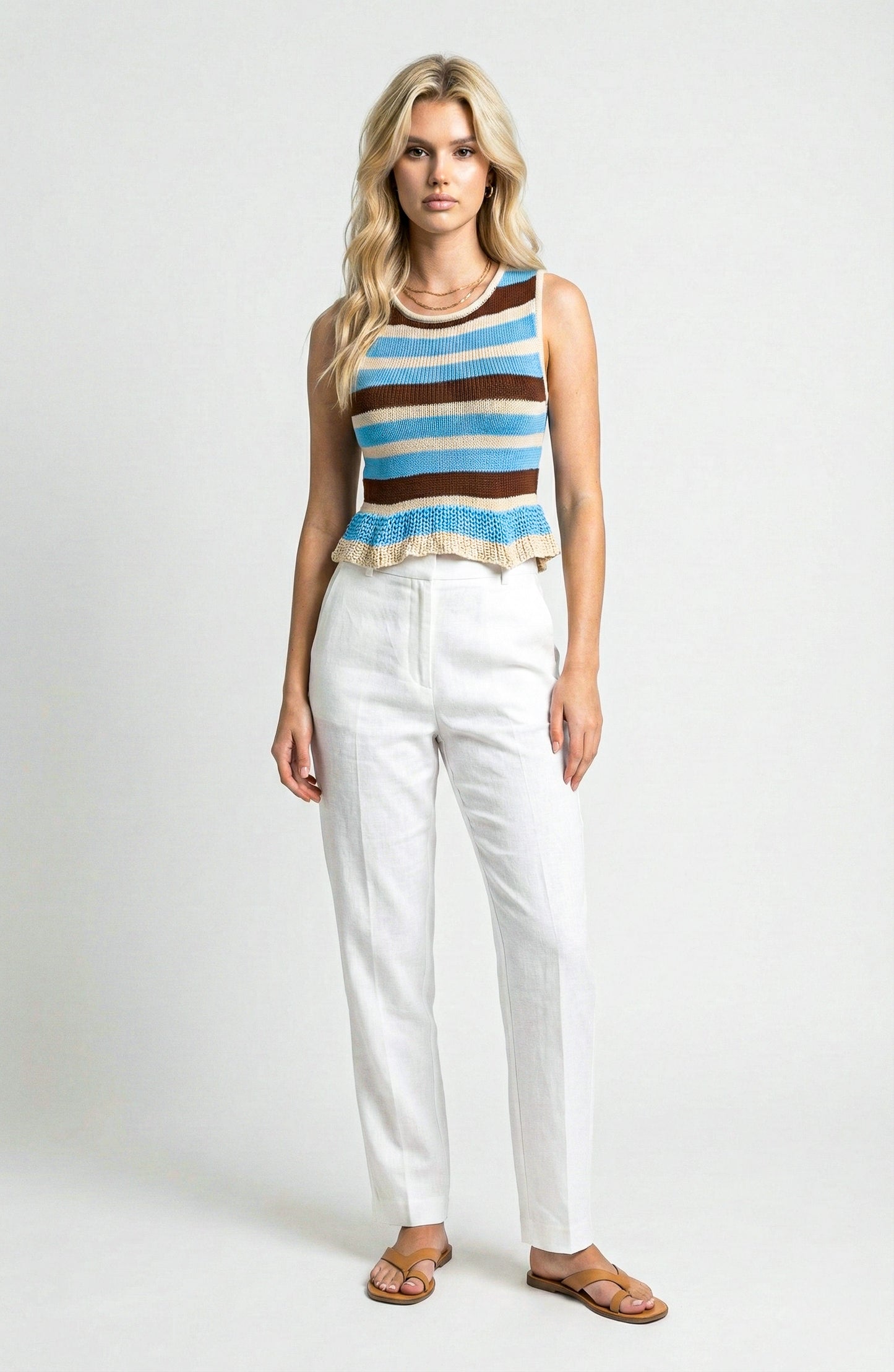 Sleeveless Knit Top with Stripe Pattern and Ruffle Hem