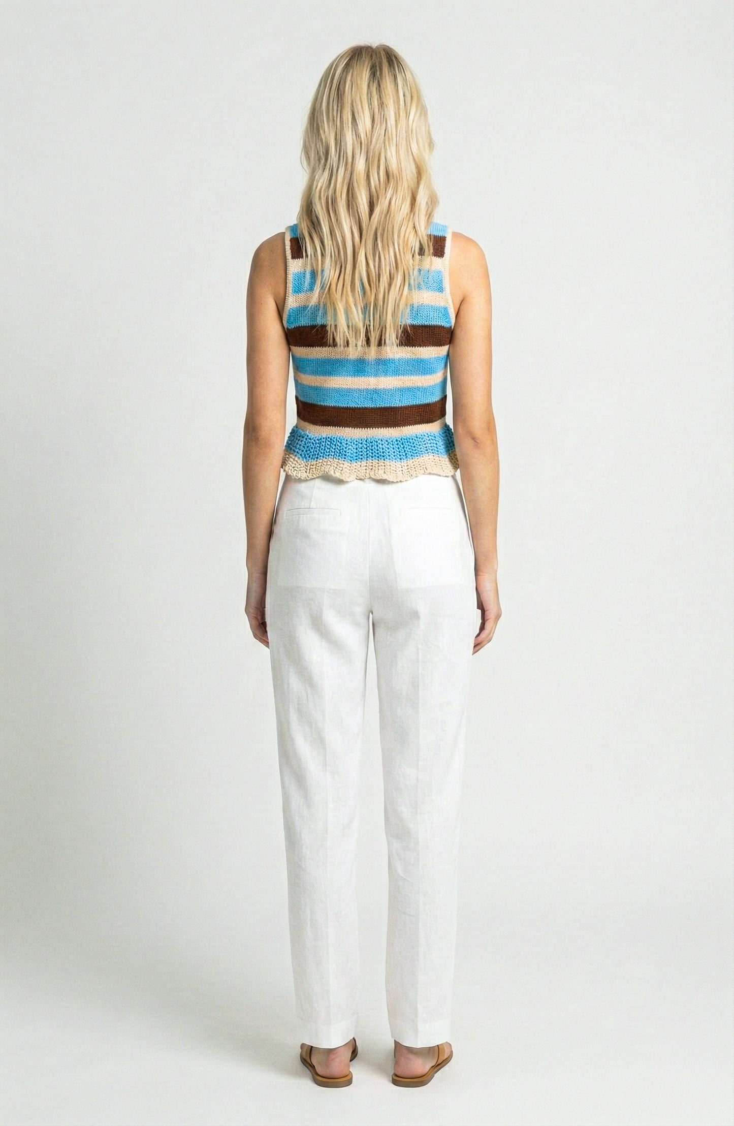 Sleeveless Knit Top with Stripe Pattern and Ruffle Hem