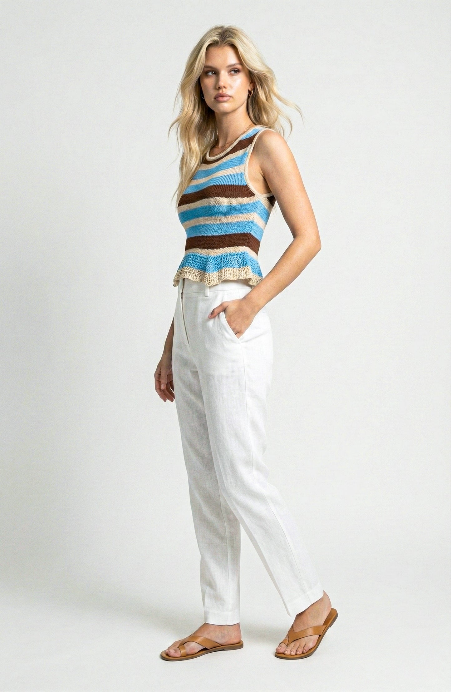 Sleeveless Knit Top with Stripe Pattern and Ruffle Hem